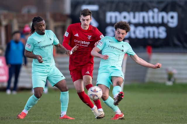 AFC Telford United's Dylan Mitchell, right, in action against Scarborough Athletic. Picture: Kieran Stoddart