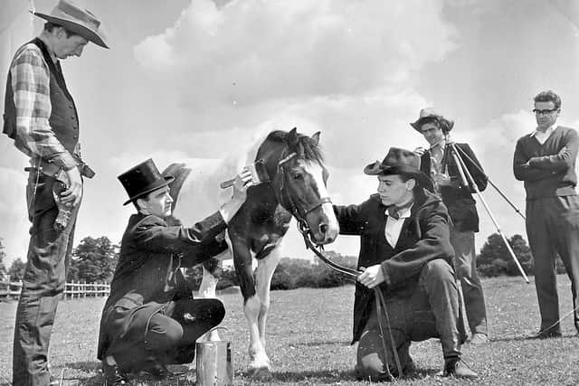 
Filming of a Western 'The Brothers Kane' in Shropshire in the summer of 1961 which was made by students of Shrewsbury School of Art and their friends. It was filmed partly at Queens Head, near Oswestry, and partly at Atcham. The film starred Dave Lee (gunman), Brian Gough (bad brother), Keith Reynolds (good brother), and Dave Rickers (town bully). 