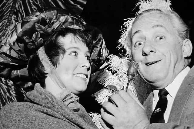 Entertainer Hughie Green at his Christmas show at the Granada theatre, Shrewsbury, in December 1968. The caption reads: 'Heather Game, of Meole Crescent, Shrewsbury, playing Eliza Doolittle from My Fair Lady, presents Hughie Green with a rose during a performance of Hughie's 'Opportunity Knocks' show at the Granada, Shrewsbury.'