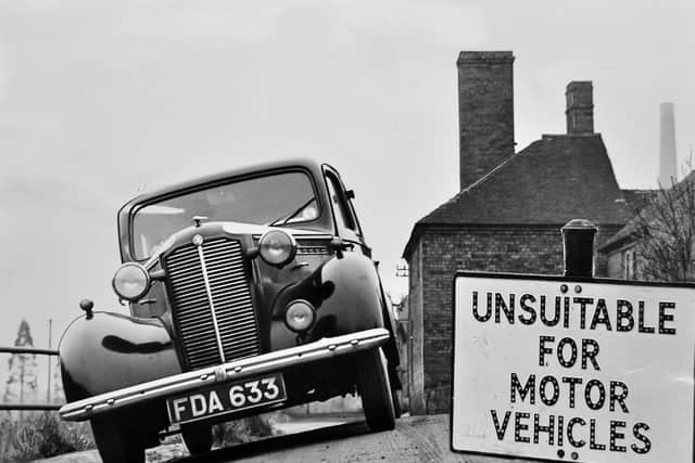 The Jackfield Slip in March 1953. The subsidence at Jackfield had began in April 1952, the caption reads: 'This notice in the subsiding Shropshire village of Jackfield means exactly what it says.' 