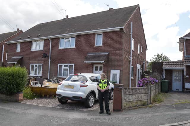 Police cordoned off the maisonette in Stephens Close, Wolverhampton, after two paramedics were stabbed. Image: @SnapperSK