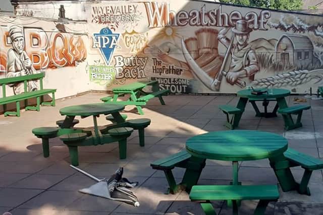 The striking mural in the garden of The Wheatsheaf