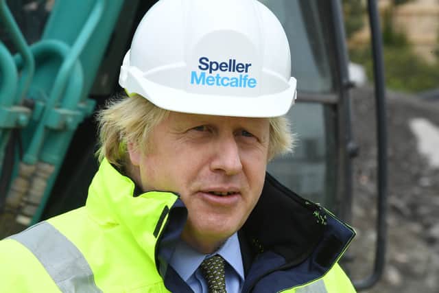 
              
Prime Minister Boris Johnson during a visit to the Speller Metcalfe's building site at The Dudley Institute of Technology. Mr Johnson is expected to announce a multi-billion pound "new deal" for infrastructure projects to help stimulate the nation's recovery from the coronavirus pandemic. PA Photo. Picture date: Tuesday June 30, 2020. See PA story POLITICS Johnson. Photo credit should read: Jeremy Selwyn/Evening Standard/PA Wire
            
