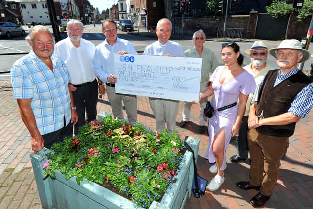 Idsall Lodge of Freemasons in Shifnal made the donation to Shifnal Help. Representing Shifnal Help are Rev Chris Thorpe, Vicar of St Andrew's Church, and volunteer Hannah Casey, joined by members of the Freemasons group