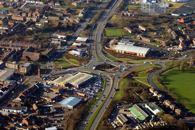 An aerial view of West Bromwich with Carters Green and its landmark clocktower (left) and the Black Country Spine route running parallel with Dudley Street