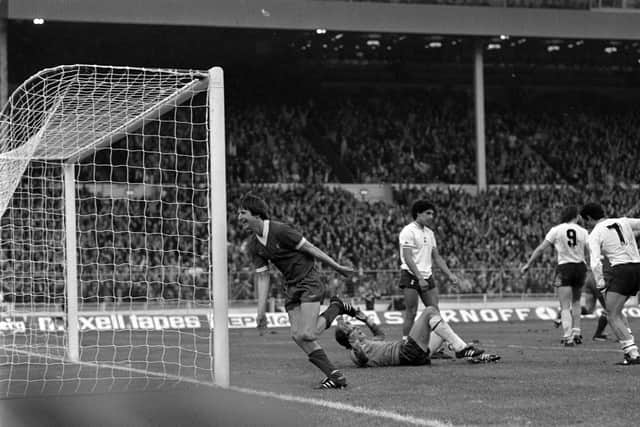 Ronnie Whelan (left) shows his delight he scores his second goal for Liverpool in the League Cup Final at Wembley..