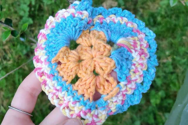 The crocheted hearts which have been appearing at sites around Telford, urging people to support local charities