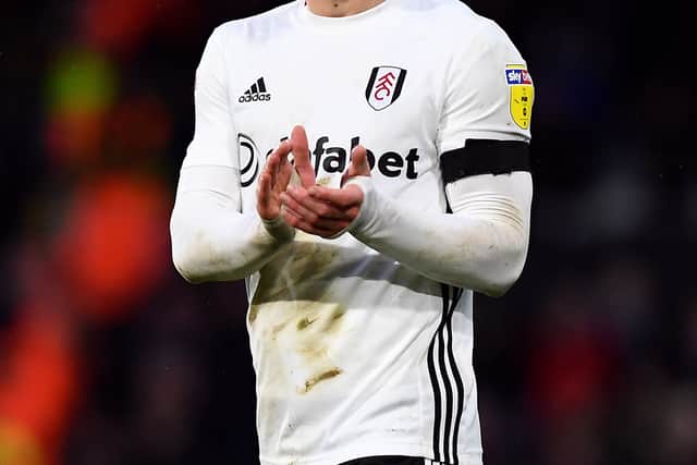 Fulham's Joe Bryan applauds the fans after the final whistle at the Sky Bet Championship match at Craven Cottage, London.