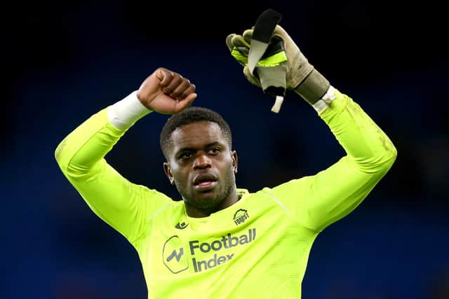 Nottingham Forest goalkeeper Brice Samba celebrates the result at the end of the Sky Bet Championship match at Cardiff City Stadium.