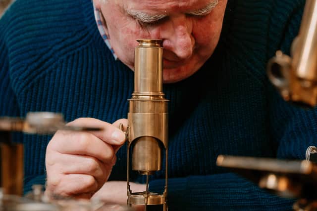 John Ridgway with the microscopes