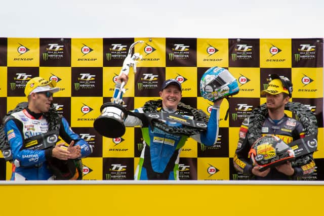 Harrison, centre, celebrates winning the 2019 Senior TT, beating Hickman, right into third, with Manxman Connor Cummins third. Picture: Ellan Vannin Images