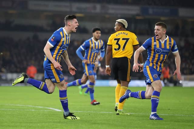 Shrewsbury Town's James Bolton celebrates
