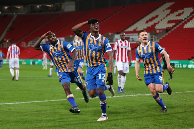 Fejiri Okenabirhie of Shrewsbury Town celebrates after scoring a goal to make it 2-2 (AMA)