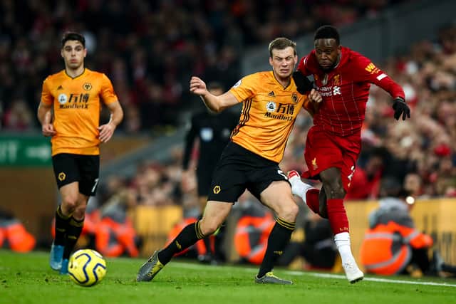 Ryan Bennett and Divock Origi of Liverpool (AMA/Sam Bagnall)