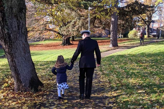 Tom and Georgia Everson walking in the park