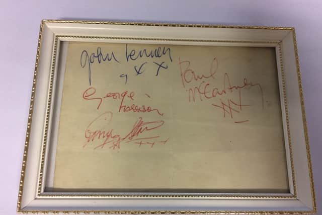 The framed set of autographs