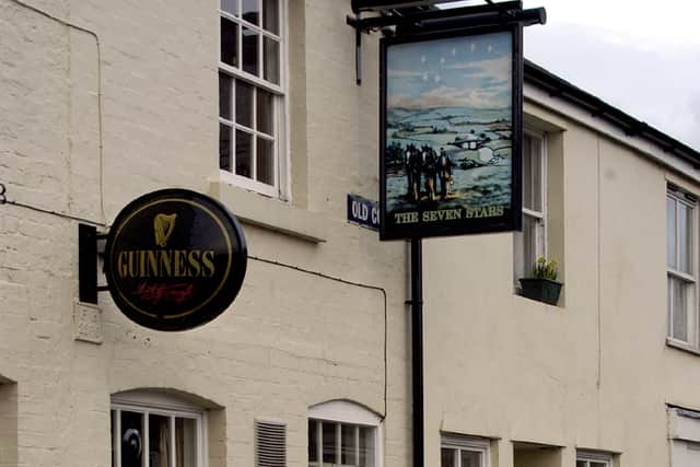 The Seven Stars at Coleham in floods in 2004. Note that in this case the pub sign draws on the stars of the Plough constellation.