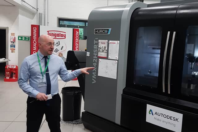 Principal technician Iain Lyall talks to guests