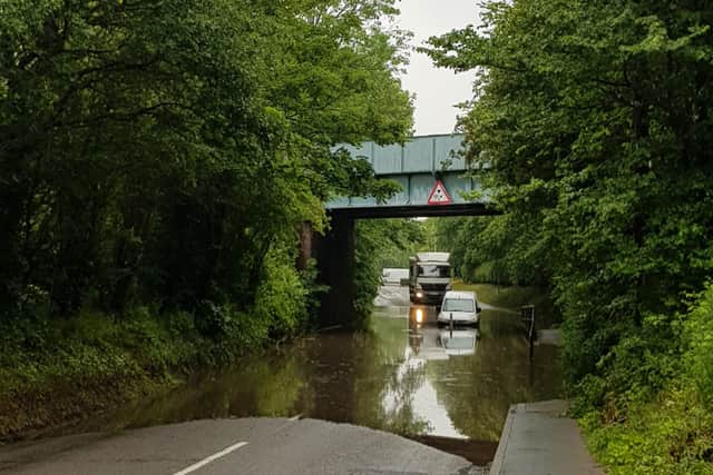 Newport Road under the railway bridge in Albrighton. Photo: @SFRS_Albrighton