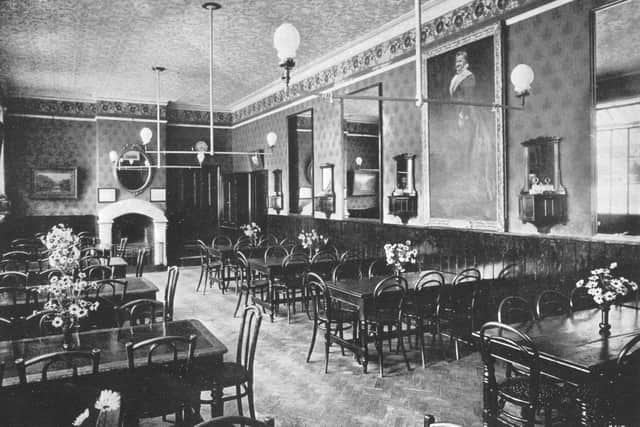 The dining hall, showing the life-size portrait of the founder which disappeared