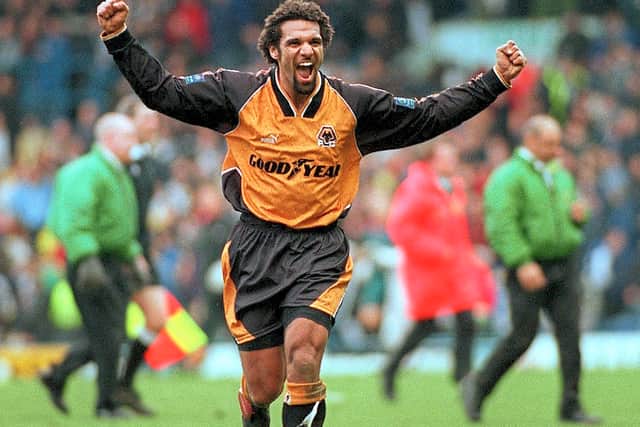 Don Goodman of Wolves beats Leeds goalkeeper Nigel Martyn to score the only goal as Wolves beat Leeds in the FA Cup Quarter Final
