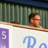 Gavin Cowan watches the game from the directors’ box