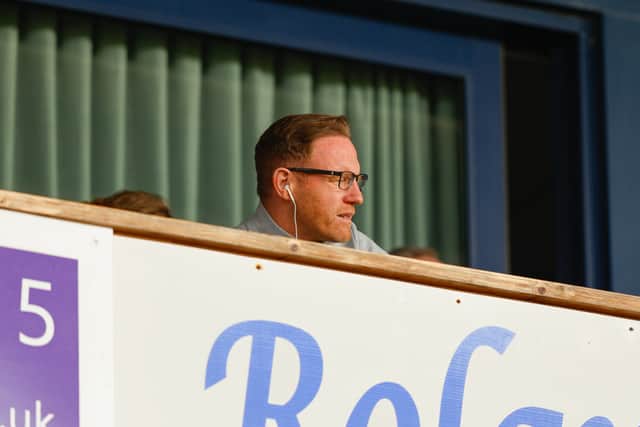 Gavin Cowan watches the game from the directors’ box