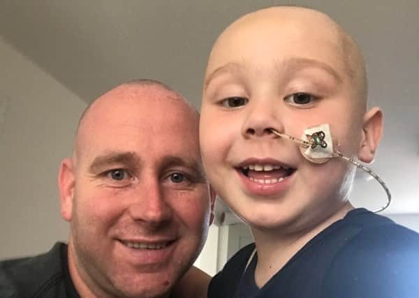 Zac with his father Mark Garbett
