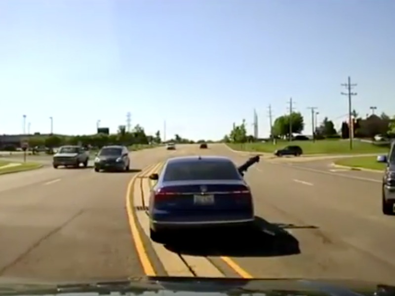 Hero dives through a car window to save a driver having a seizure
