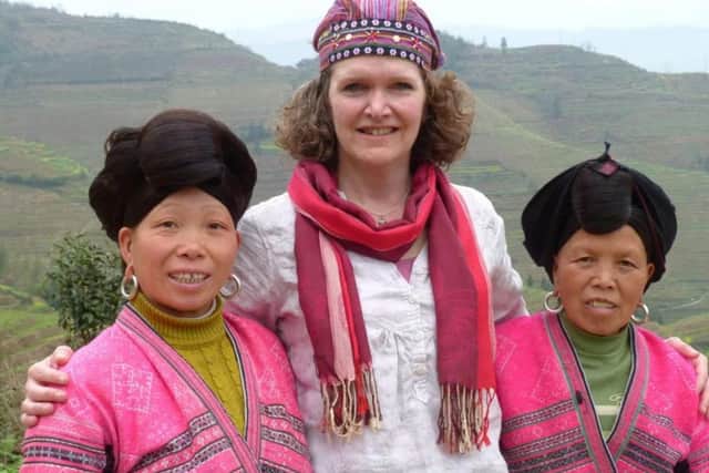 Daughter Mary in China, where she retraced the route of his epic wartime escape