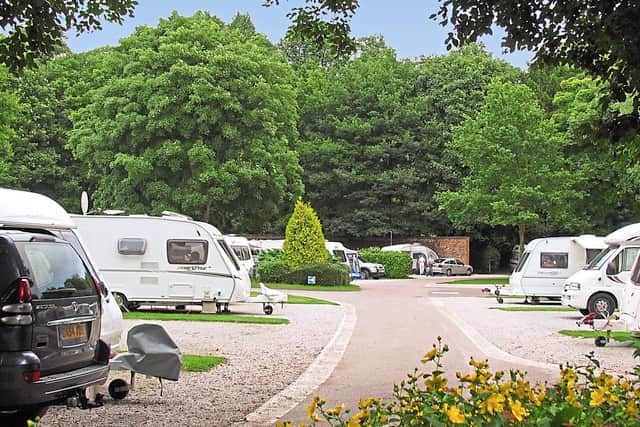 The ‘secret garden’ doorway’ behind the motorhomes and caravans at the Chatsworth Park site, which leads to the Chatsworth House estate in Derbyshire