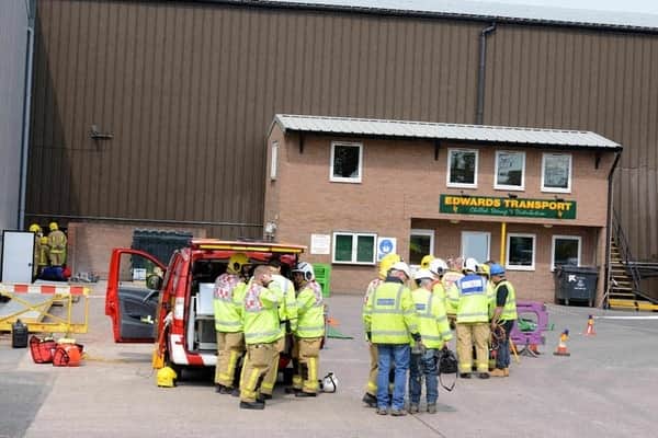 Emergency crews outside the Edwards Transport warehouse