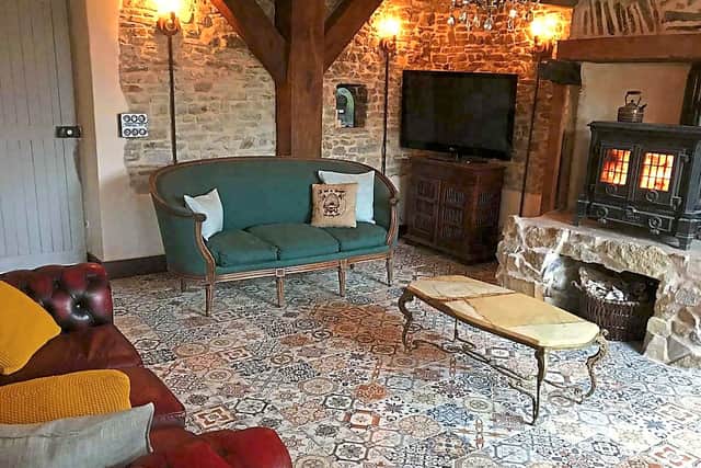 Open the front door and you enter this living area