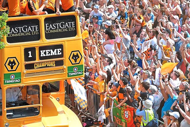 An open top bus pays tribute to Carl Ikeme
