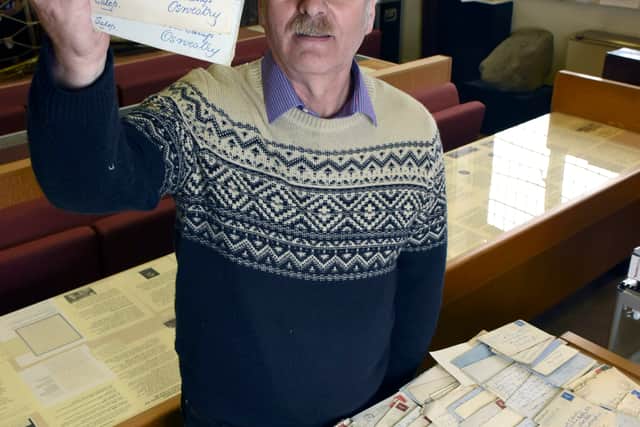 Mark Hignett with the letters