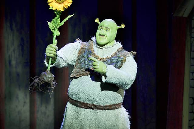 Steffan Harri as Shrek. Shrek the Musical. Photos by: Helen Maybanks