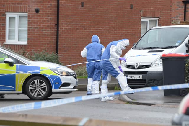 Forensic officers have been examining the scene