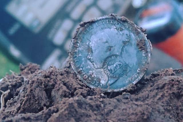 A Queen Victoria sixpence, counter stamped for use in Costa Rica.
