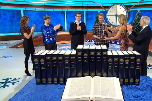 Tom being presented with the trophy by the show’s resident mathematician Rachel Riley