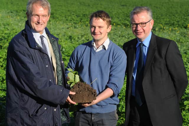 Environment minister Michael Gove MP, with Owen Paterson and farmer Tim Ashton