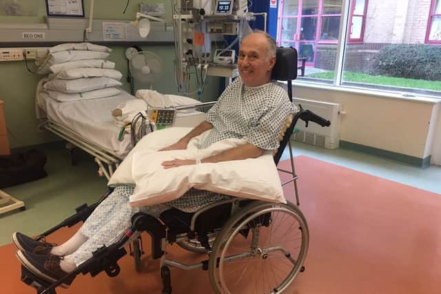 Alan Jenkins is now able to sit in a wheelchair, but without the use of his arms his family want to get him a wheelchair he may be able to operate himself