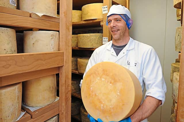 Dairy manager Dudley Martin, in the cheese maturing room