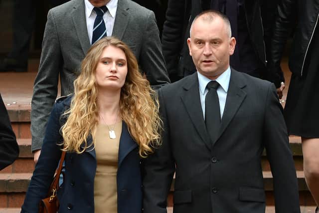 Peter Wilkinson leaves Birmingham Crown Court with his daughter Lydia, after Barley pleaded guilty to the murders of his wife and son