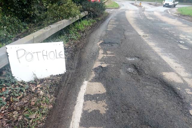 Motorists were warned about potholes at the junction of the A495/A528. Picture: Rob McBride