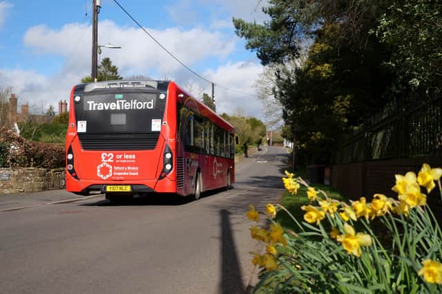 A bus heads down Church Road in Lilleshall 