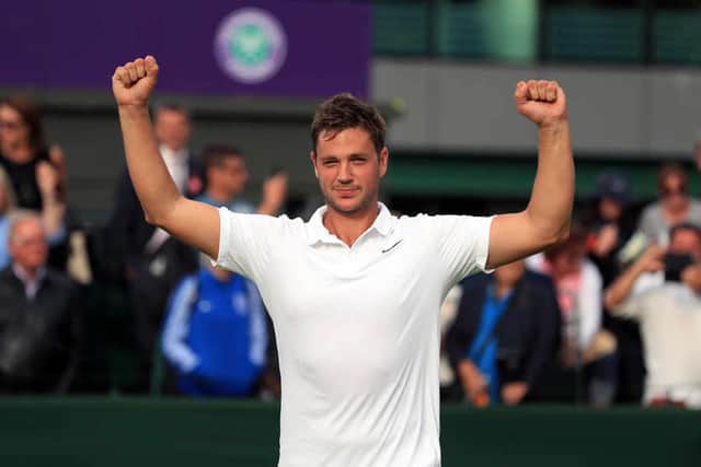 Marcus Willis, the thenworld number 772 celebrates victory over 54th-ranked Ricardas Berankis 6-3 6-3 6-4 on day one of the 2016 Wimbledon Championships.