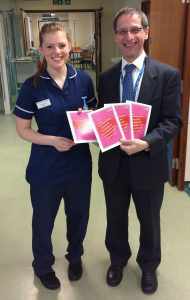 Sister Helen Griffiths from Ward 32 at the Royal Shrewsbury Hospital receives her card from Dr Edwin Borman