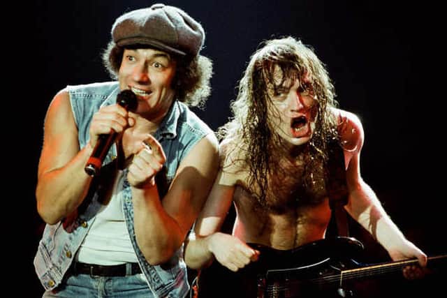 Brian Johnson and Angus Young of AC/DC in 1986