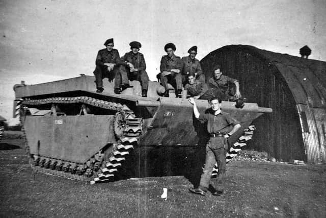 In Germany – Bill, seen standing, with other soldiers