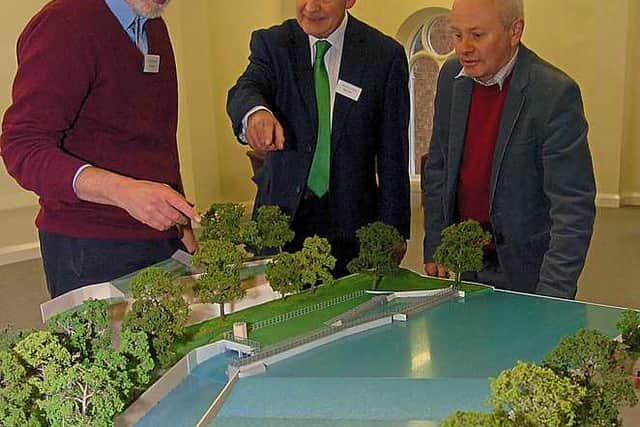 Dave Green and Mark Scutt with Len Marlow, from All Rivers Hydro